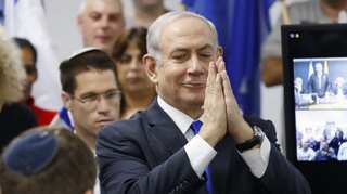 Defiant Netanyahu goes on trial in Israel charged with corruption