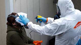 China reports more coronavirus cases from abroad amid strict quarantine measures