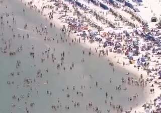 Hundreds pack Florida beach despite coronavirus outbreak in US