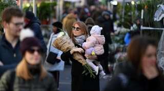 Boris Johnson warns of tough actions as Britons continue to gather in large numbers