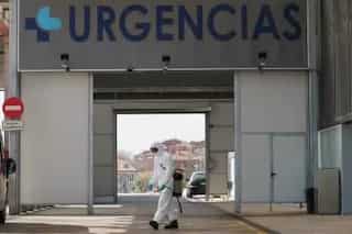 Spain counts 832 deaths in 24 hours, pushing toll to 5,690