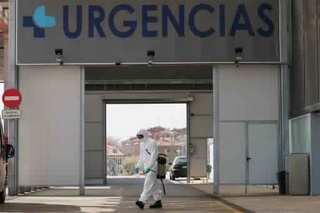 Spain counts 832 deaths in 24 hours, pushing toll to 5,690