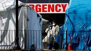 'We're trying to keep our heads above water': US healthcare workers fight shortages and fear