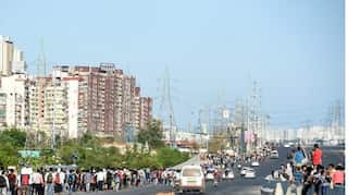 Coronavirus lockdown: Migrants walk on foot, board buses at UP's Ghaziabad
