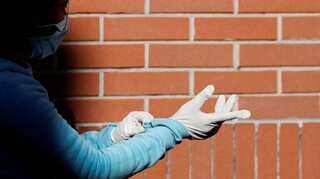 World’s largest glove maker sees shortage as coronavirus fight spikes