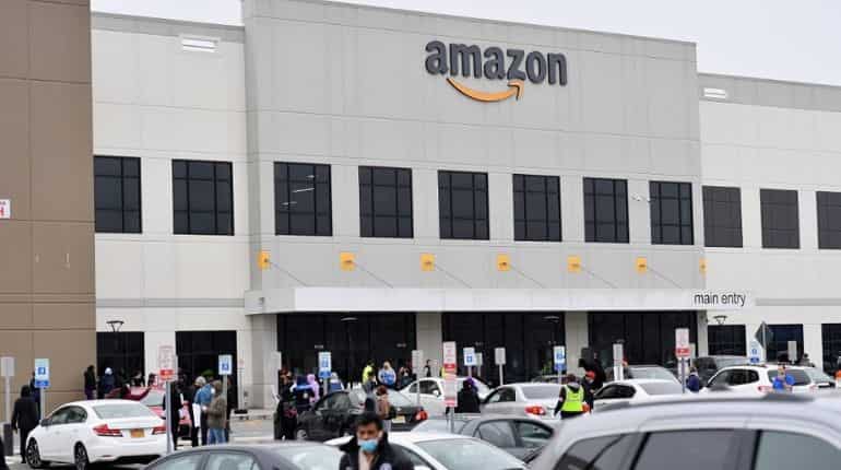 Amazon workers stage walkout demanding better protective measures against killer virus in NYC Amazon workers stage walkout demanding better protective measures against killer virus in NYC