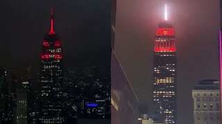 New York's Empire State Building lights up with red and white light amid coronavirus pandemic