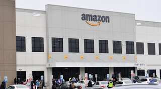 Amazon to deploy masks and temperature checks for workers by next week