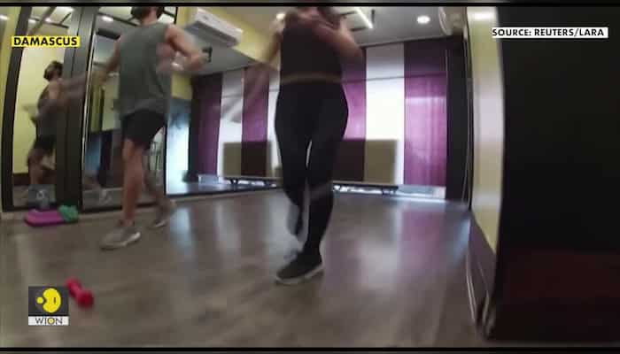 Can't stop, won't stop: Syrian gym coaches stay fit