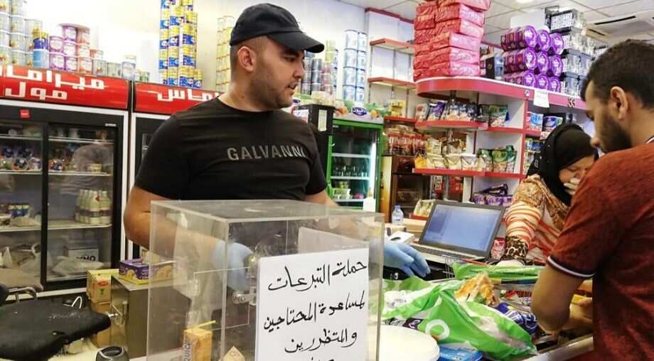 Iraqis rally to help needy families as virus hits, economy falters