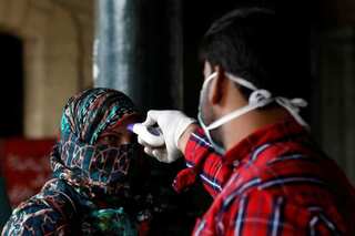 Pakistan extends coronavirus lockdown, seeks to lift some curbs