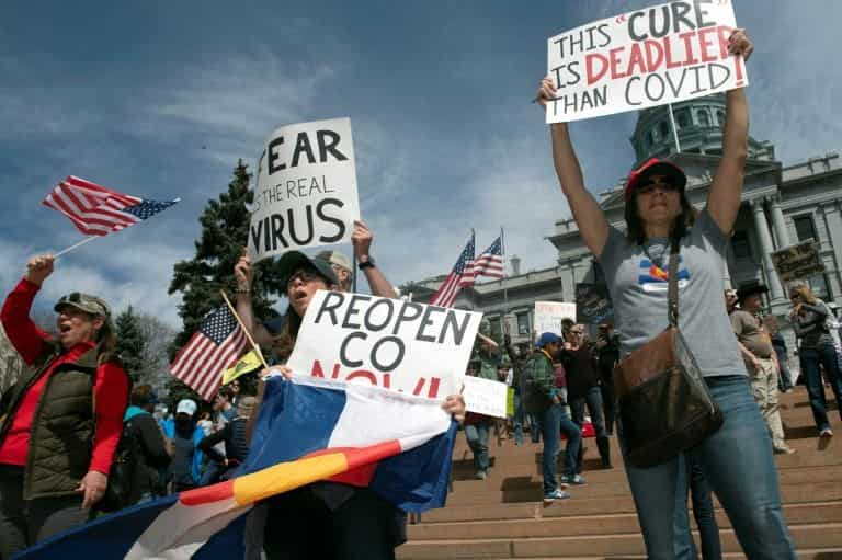 Protestors converge at Washington state capitol to rally against coronavirus curbs Protestors converge at Washington state capitol to rally against coronavirus curbs