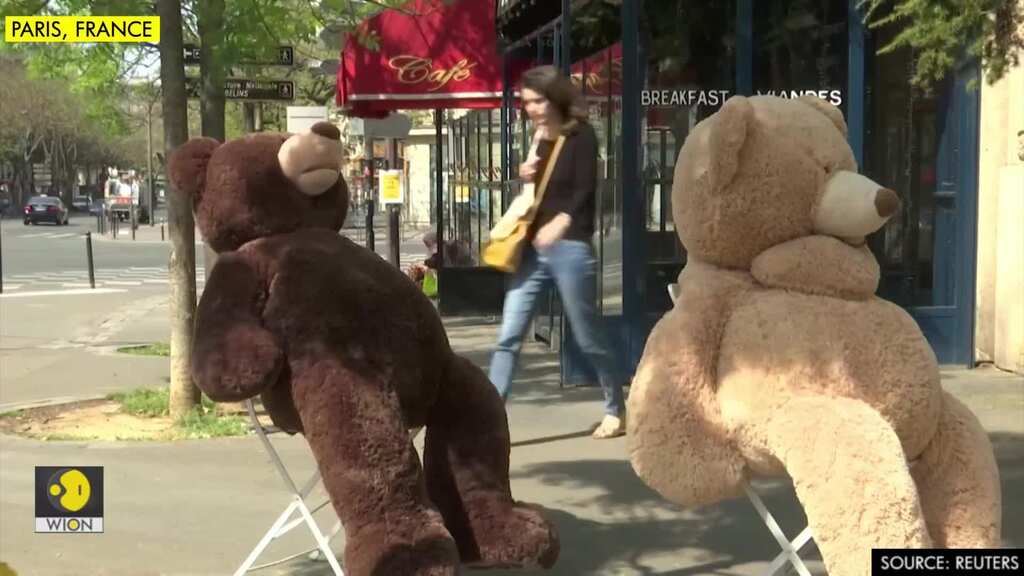 Teddy bears remind Paris of social distancing at newspaper store