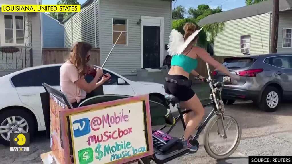 New Orleans violinist and pedicab operator take show on the road to lift spirits