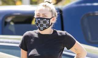 Miley Cyrus fights COVID-19 with style in Gucci face mask