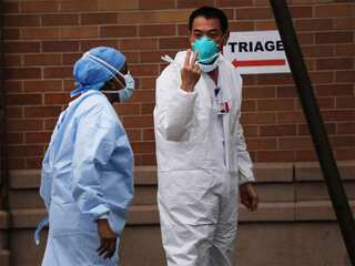 New coronavirus variant hits US as Biden vows all-out effort
