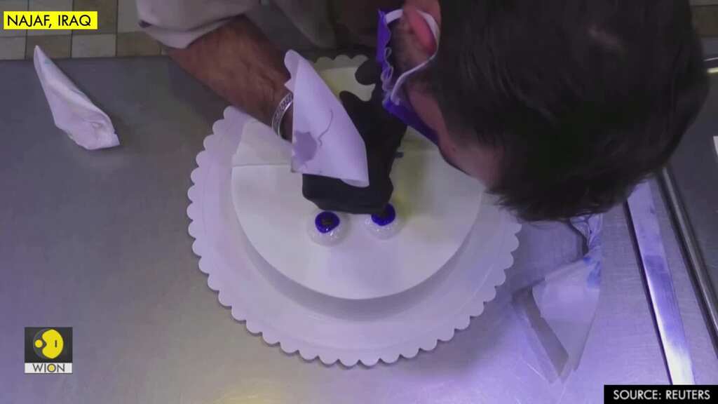 Iraqis can get a bite of coronavirus-shaped cake decorated with disinfectant