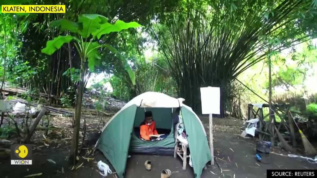 Indonesian serves self-quarantine in bamboo forest and cleans the river
