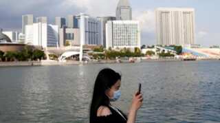 'We are not out of the woods': Singapore government warns people