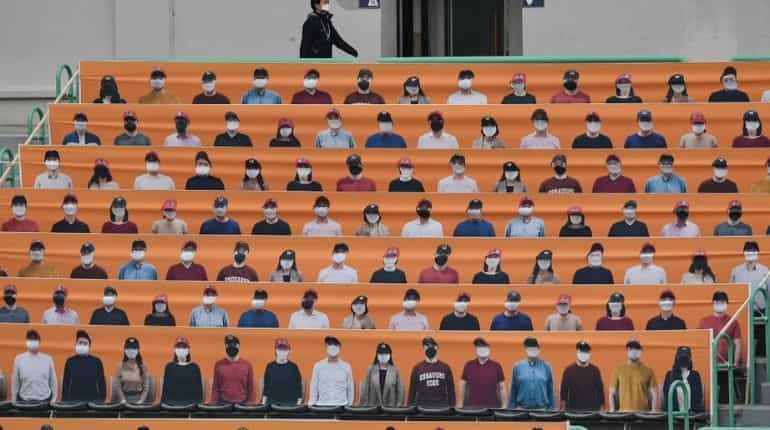 'Masked fans' across the stadium