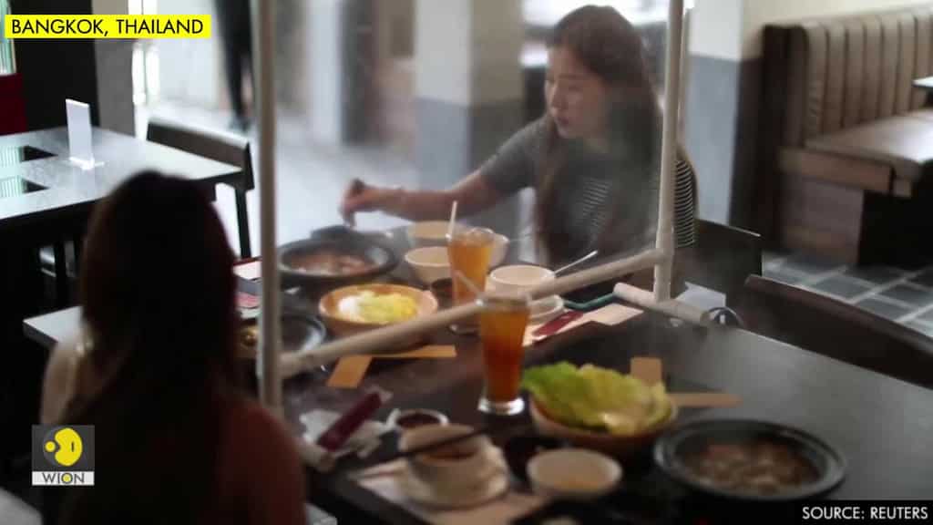 Thai hot pot restaurant separates diners with plastic screens after restrictions eased
