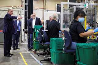 Trump tours a new face-mask factory without wearing one himself!