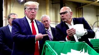'Live and Let Die' blasts as Trump tours mask factory, without wearing one