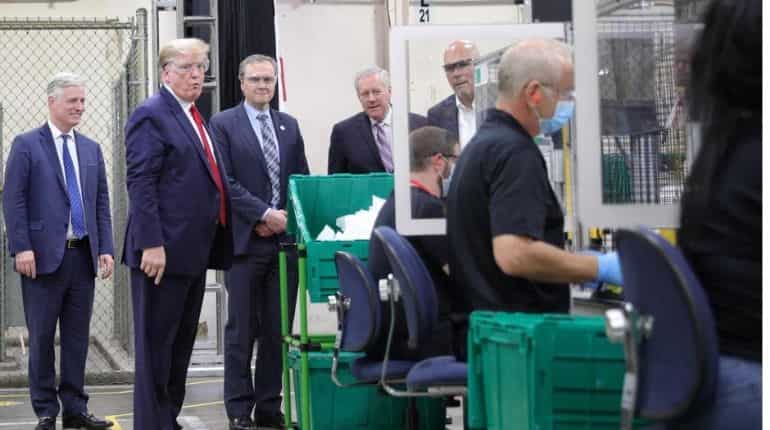 US President Donald Trump visits mask manufacturing facility, forgets to wear mask US President Donald Trump visits mask manufacturing facility, forgets to wear mask