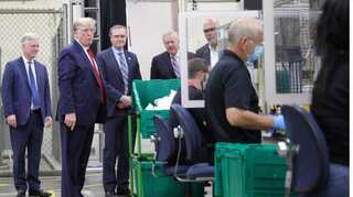 US President Donald Trump visits mask manufacturing facility, forgets to wear mask