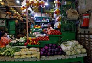 Indian inflation eases, but COVID-19 curbs risk stoking prices