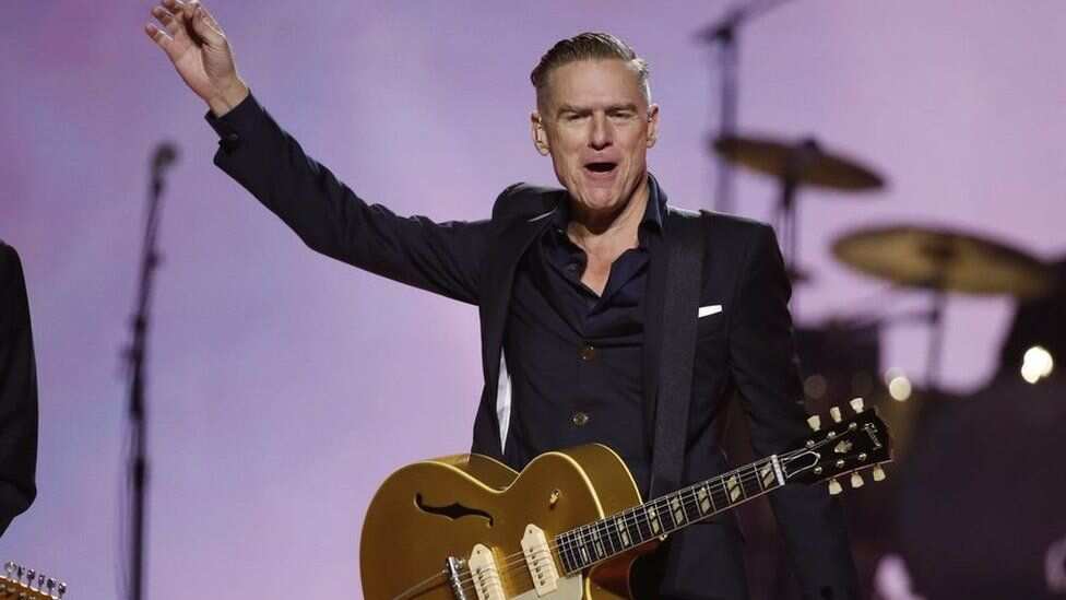 Bryan Adams gets ambushed by a fan mid-concert, watch video