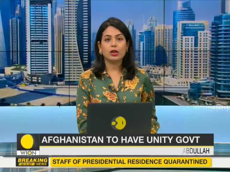 Ghani and Abdullah sign power-sharing deal