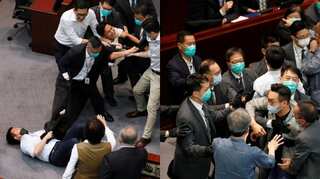 Hong Kong protests: Legislators resort to punches while discussing national anthem bill