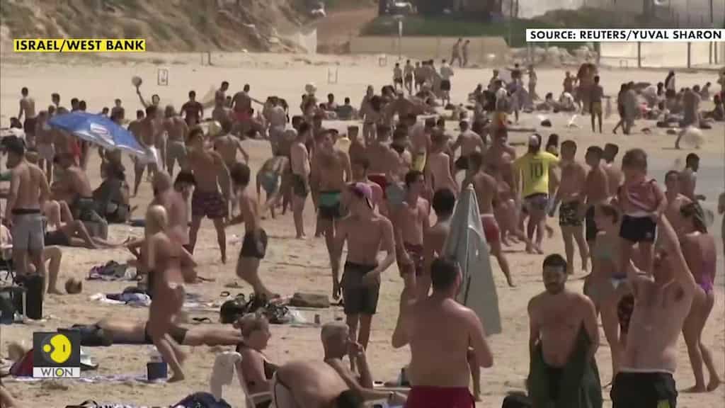 People flock to beaches as Israel, West Bank bake in heatwave