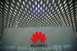 Britain bans Huawei from its 5G network as UK chairman John Browne resigns