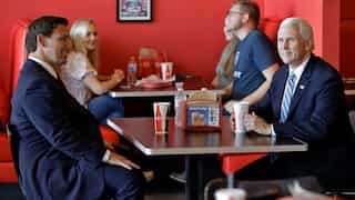 US Vice President Pence visits crowded restaurant without wearing mask