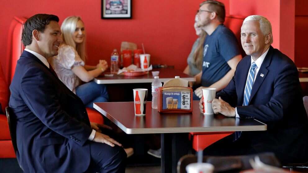 US Vice President Pence visits crowded restaurant without wearing mask