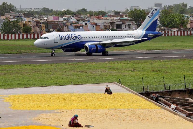 Limits on air fares, protective suits for crew among new rules as India resumes flight services