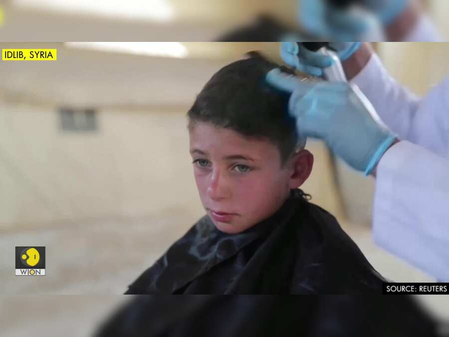 In Syria's Idlib, traveling barbers bring children relief