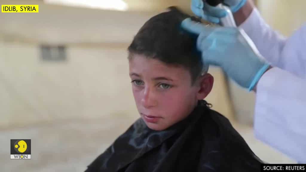 In Syria's Idlib, traveling barbers bring children relief