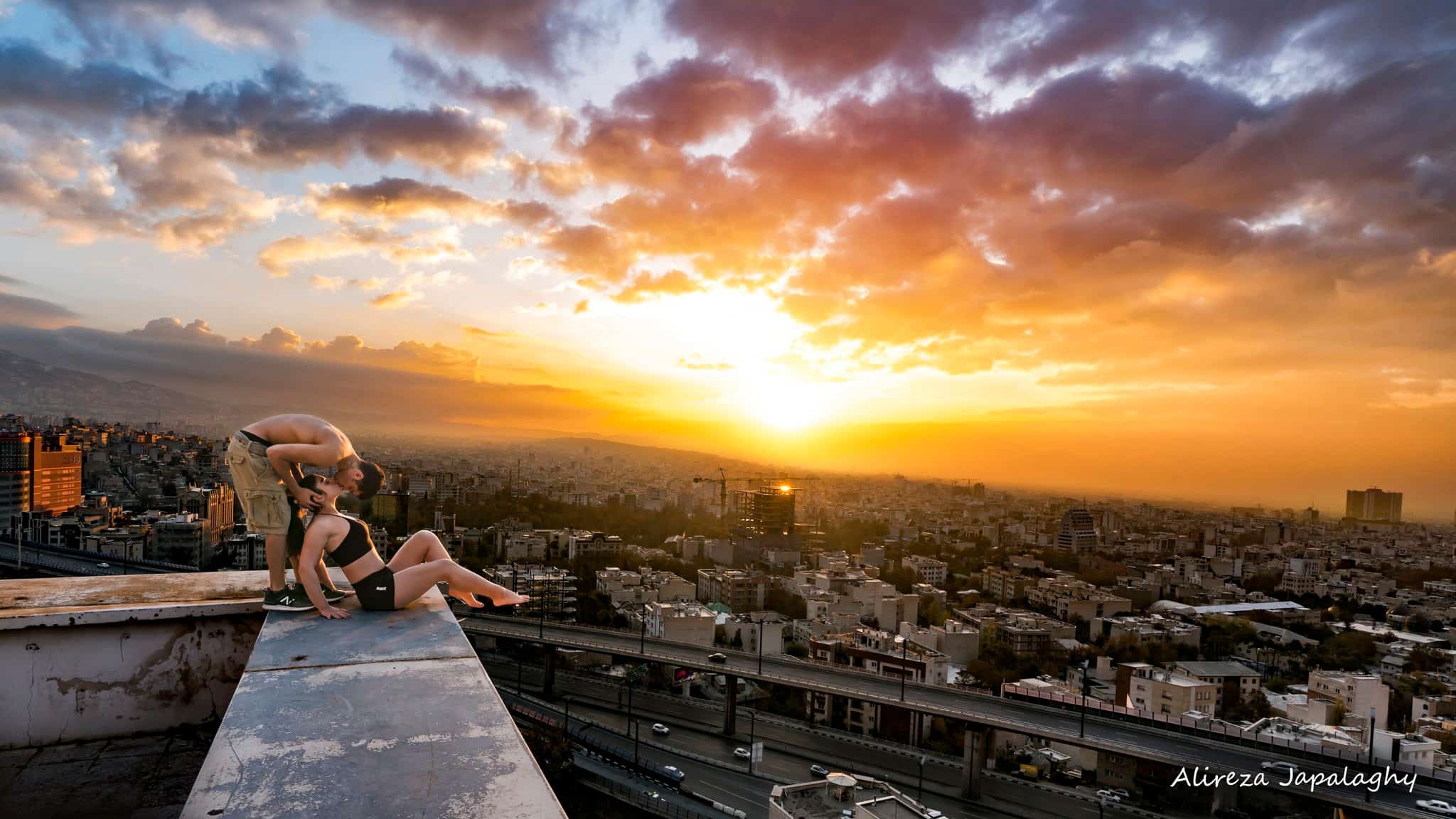 Iranian police face social media backlash over arrest of parkour athlete after rooftop kiss