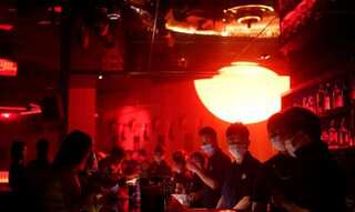 Women dance to their own beat in China's nightclubs