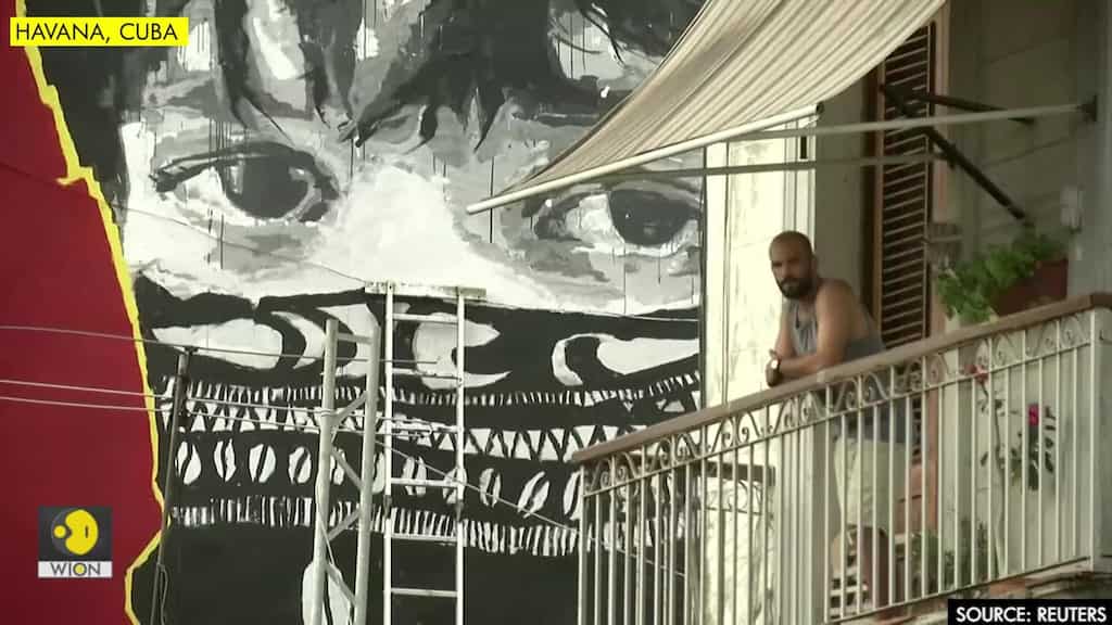Cuban graffiti artists take over walls and rooftops to illustrate life amid pandemic