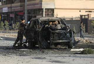 Bomb in Afghanistan capital targets TV bus; journalist and driver killed