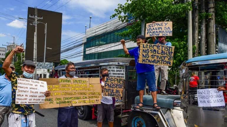 Traffic jams, long queues seen in Manila as one of world's longest lockdowns lifted