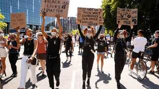 Does recent violence in US indicate a basic flaw in American society?