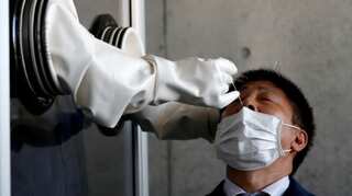 Japan approves saliva-based tests for safer, simpler detection of COVID-19