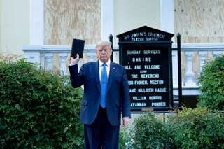 US President Trump poses for cameras with bible in hand amid riots