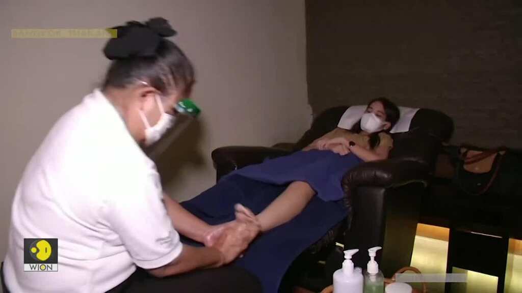 Thais head for a massage and a movie as virus lockdown eases