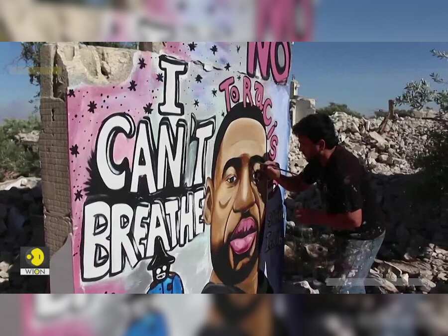 Syrian artist paints portrait of George Floyd on Idlib wall